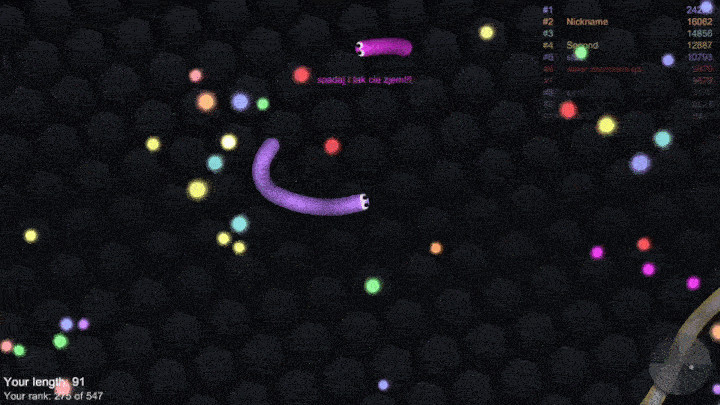 alt text: Rắn Slither.io sử dụng tăng tốc để bẫy đối thủ