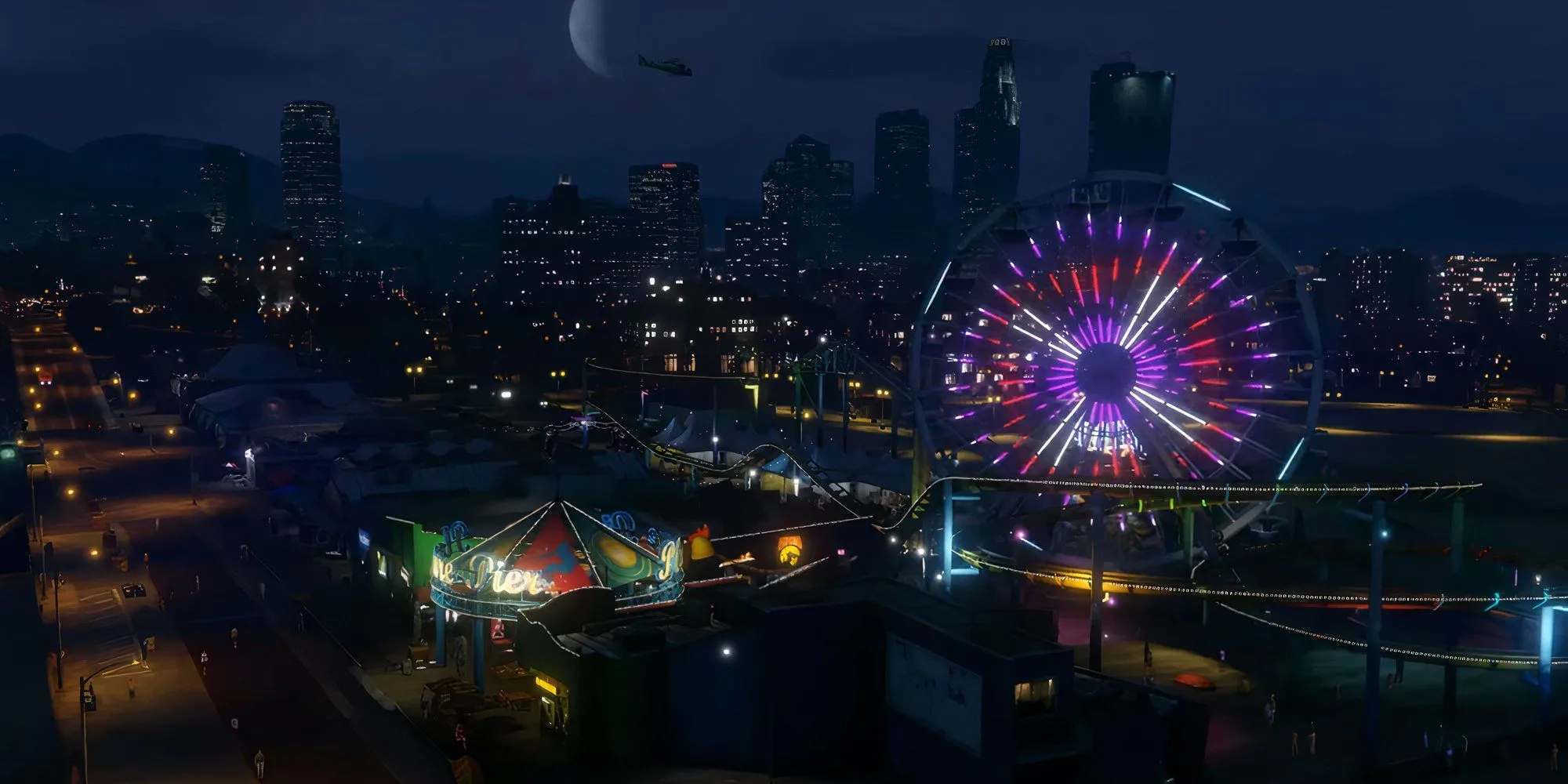 Bến tàu Del Perro rực rỡ ánh đèn vào ban đêm trong GTA 5, một địa điểm quen thuộc của người chơi