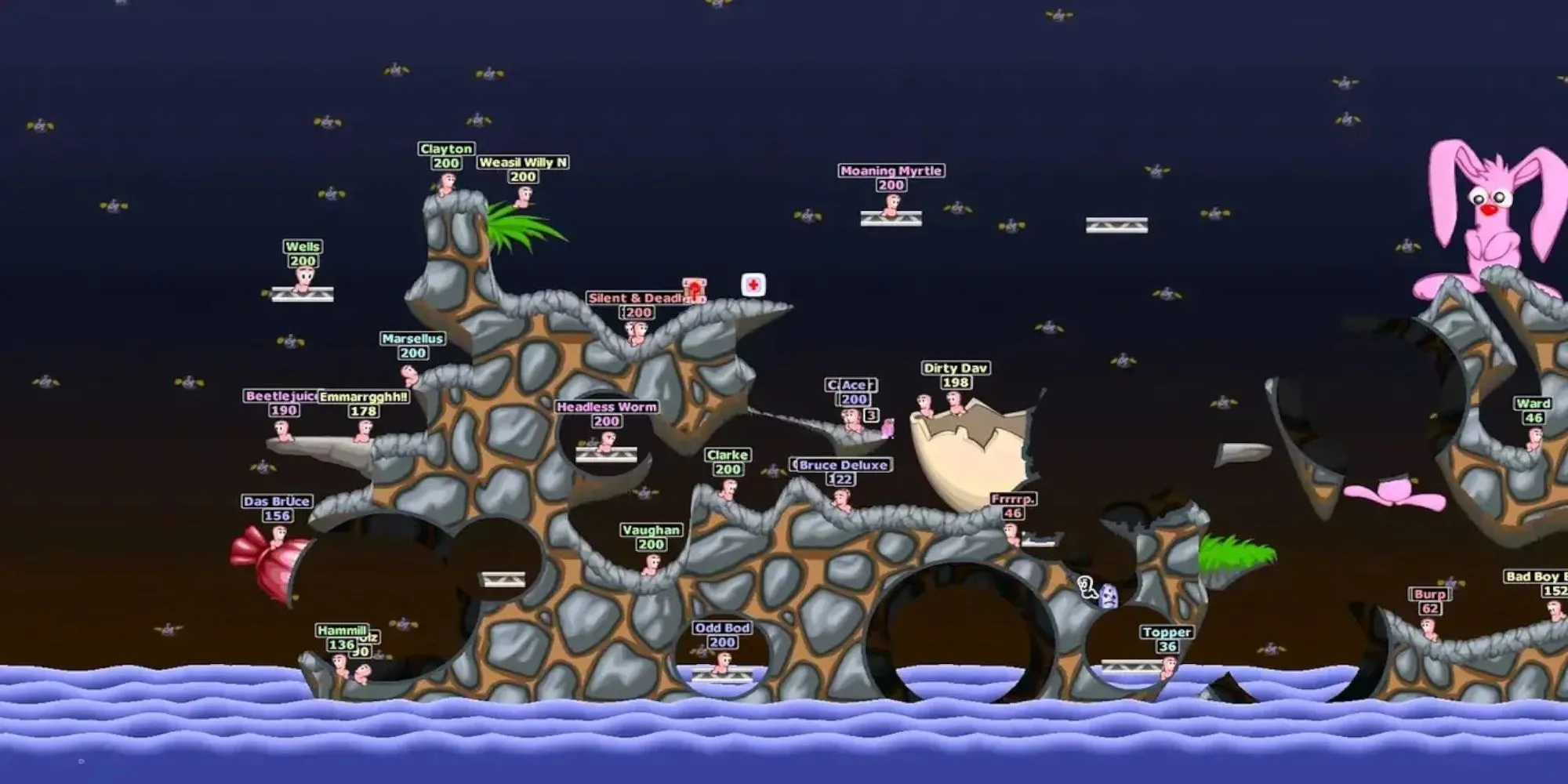 Các chú sâu đang giao chiến trong một trận đấu của Worms World Party PS1