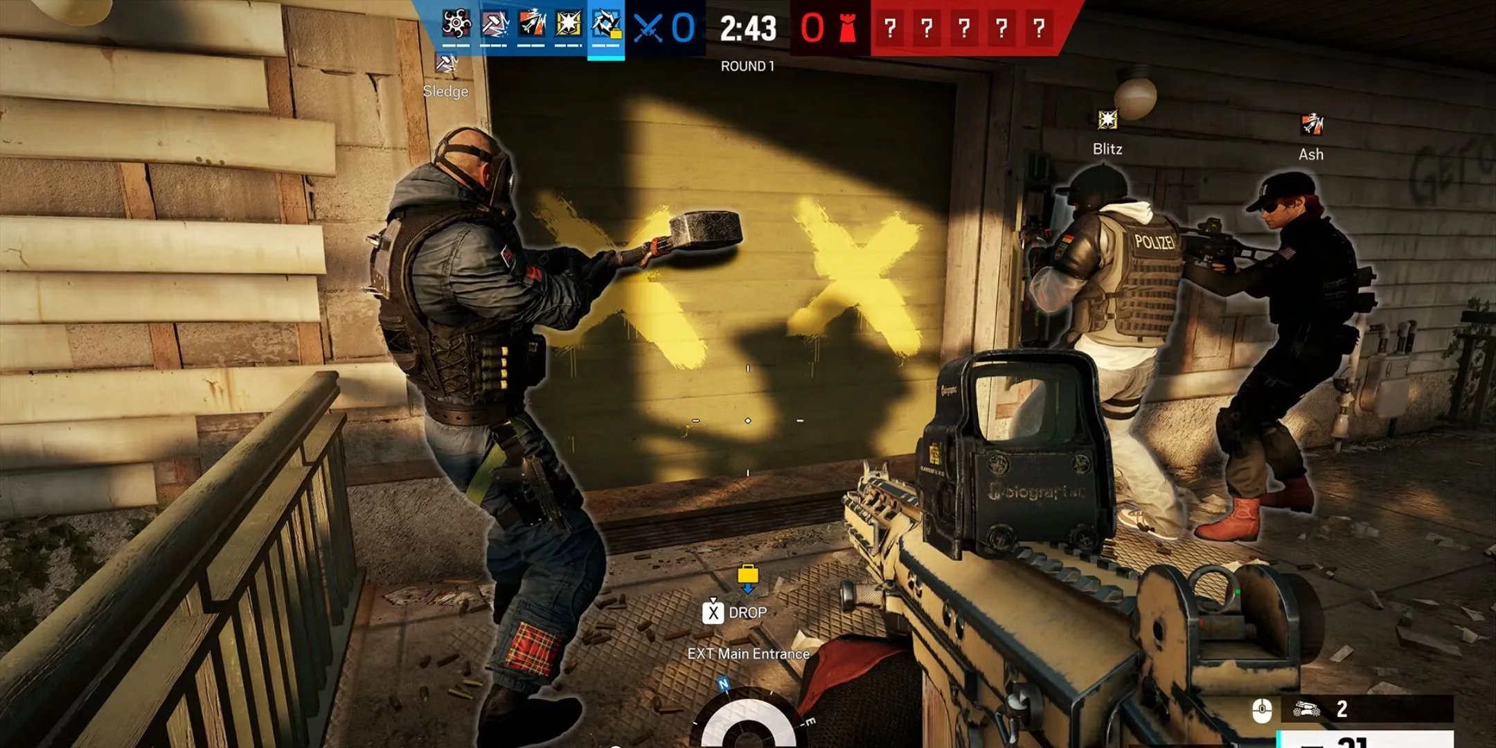 Đội đặc nhiệm Rainbow Six Siege chuẩn bị phá cửa xông vào phòng đối phương