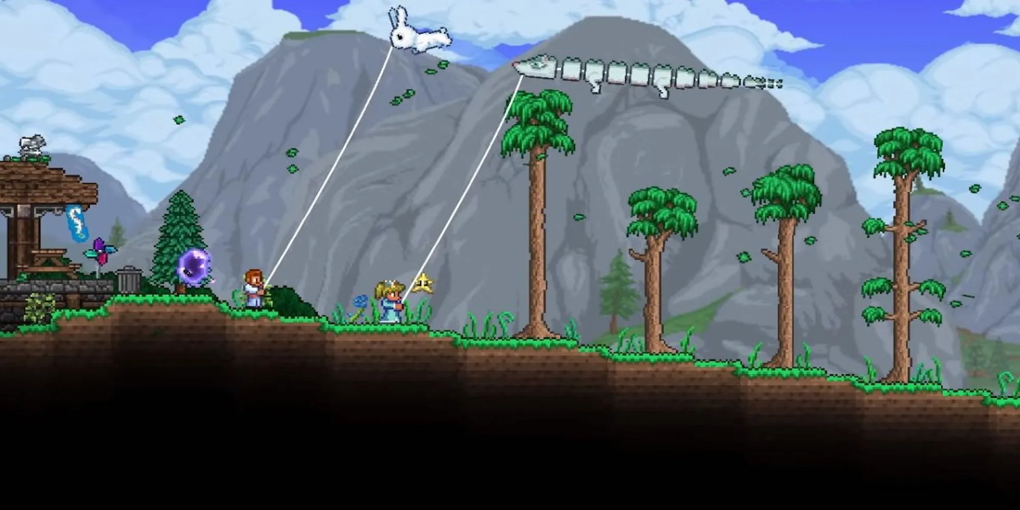 Hai người chơi đang thả diều trong game Terraria
