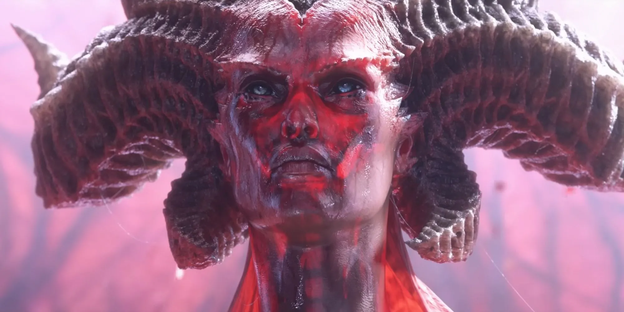 Lilith trong Diablo 4 - cận cảnh khuôn mặt đầy máu từ cinematic