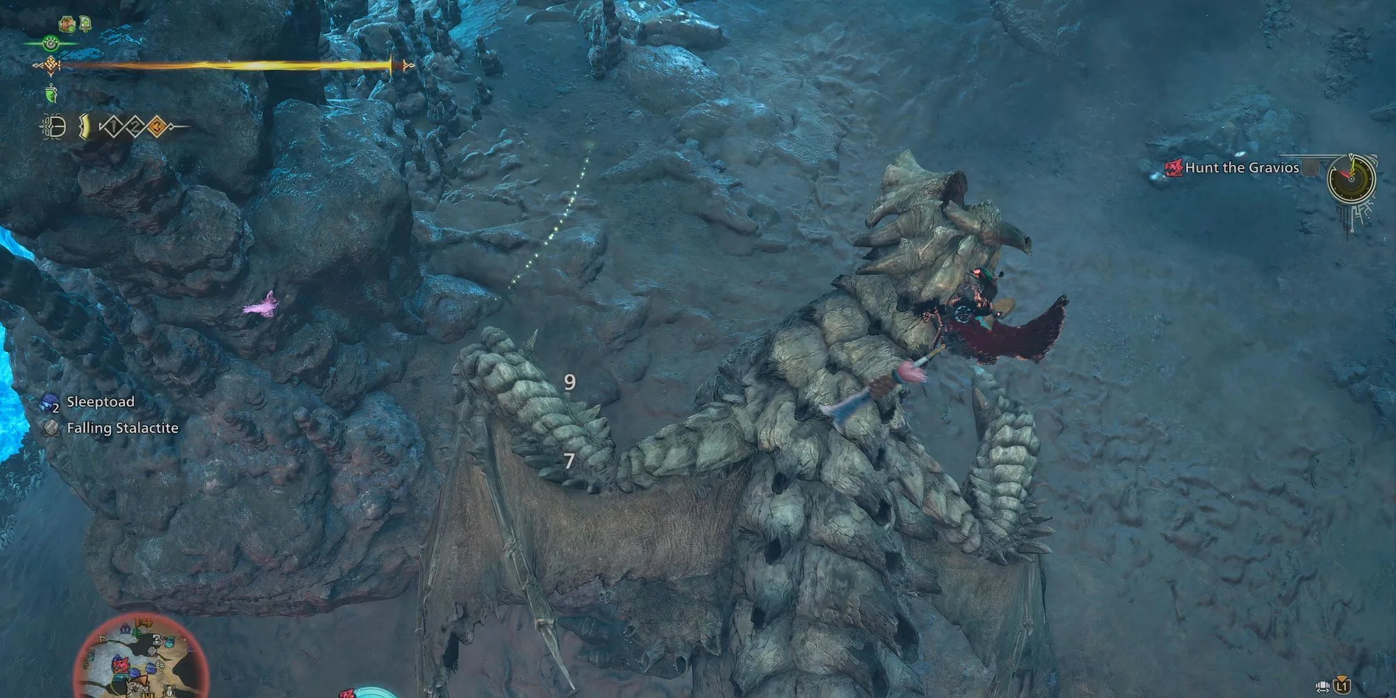 Thợ săn đang tấn công vào bụng Gravios trong Monster Hunter Wilds, một điểm yếu quan trọng