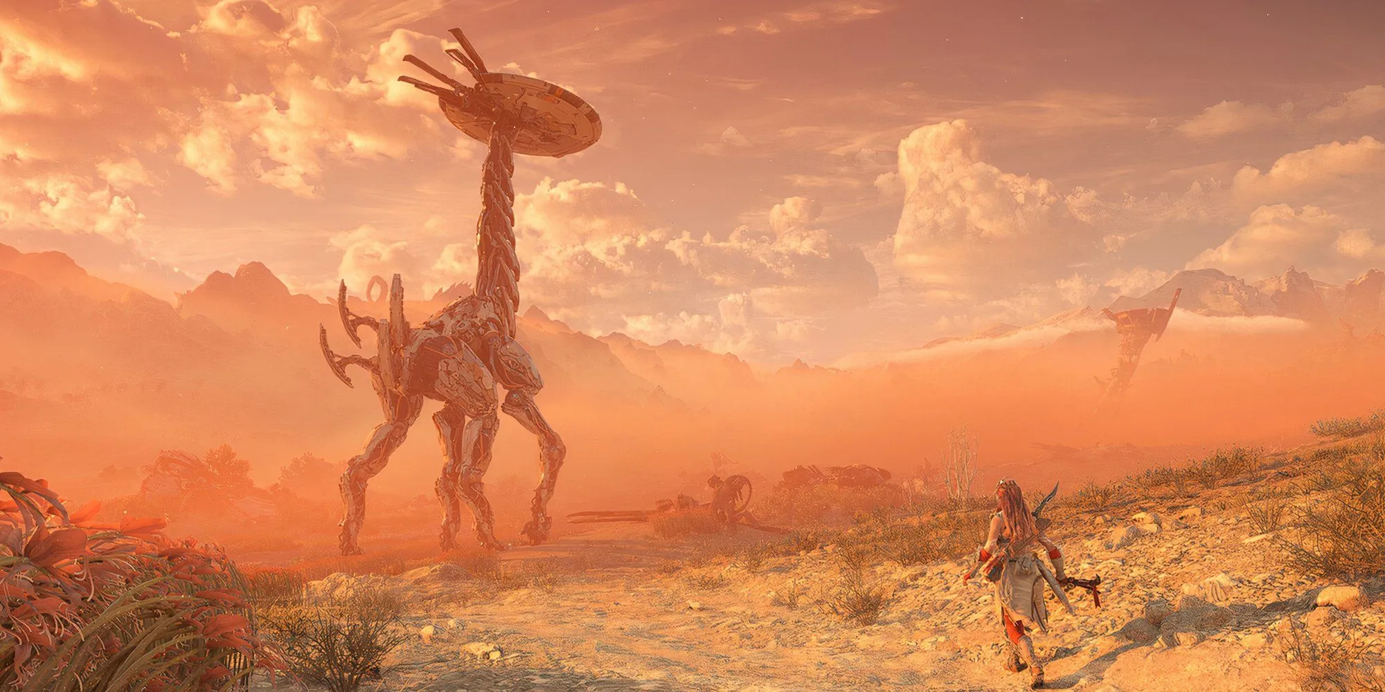 Aloy, nhân vật chính, đối mặt với một cỗ máy khổng lồ ngoài trời trong Horizon Forbidden West