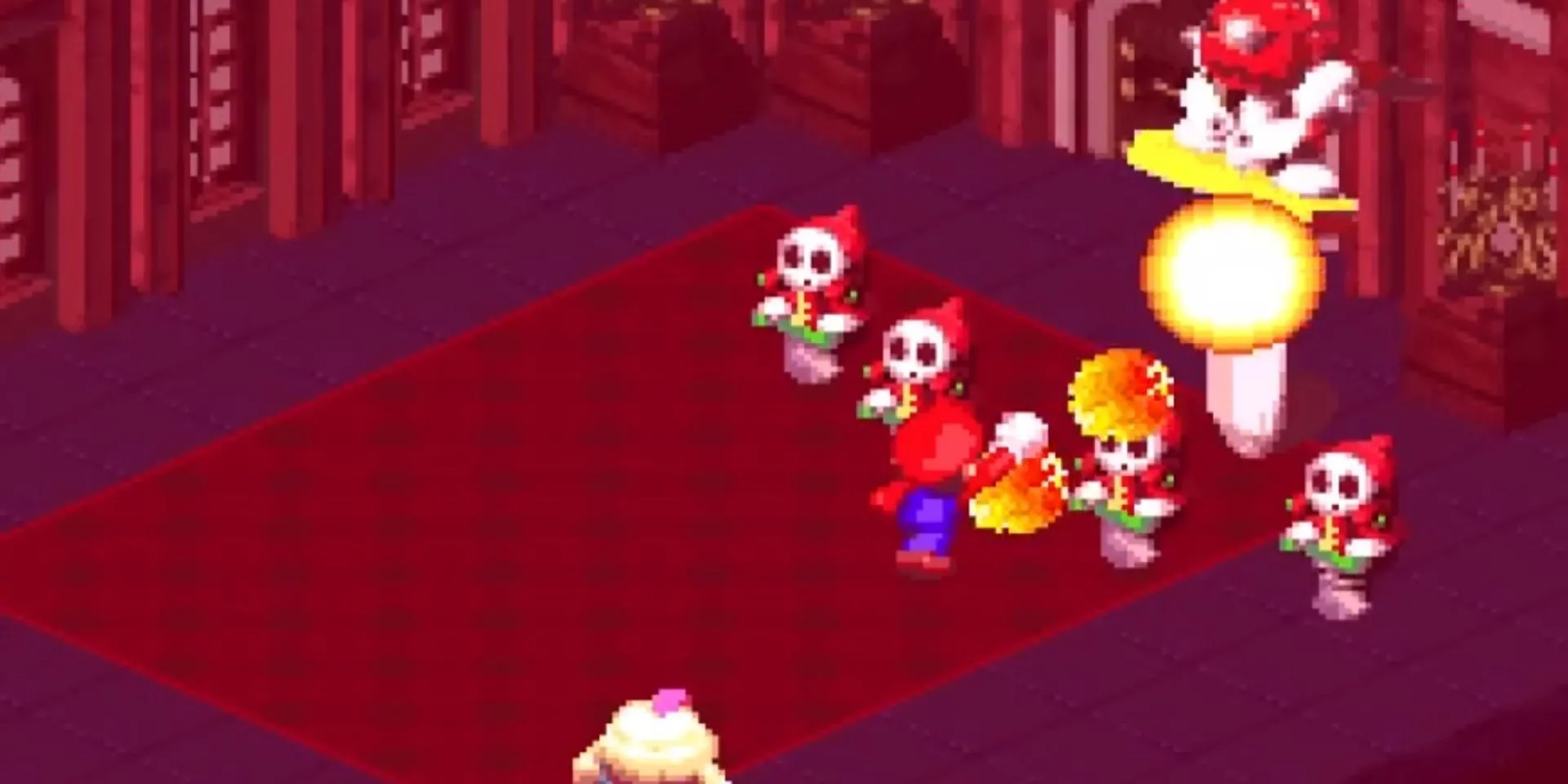 Mario dùng chiêu Fire Sphere tấn công Mack trong game Super Mario RPG: Legend of the Seven Stars trên SNES