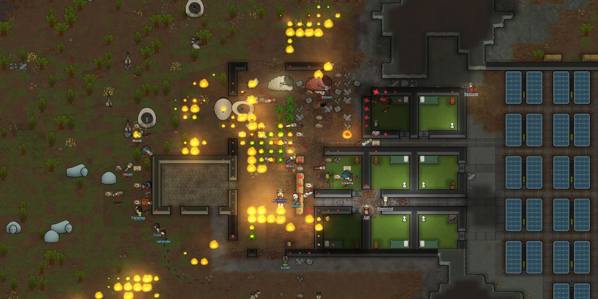Một căn cứ trong game RimWorld đang bốc cháy