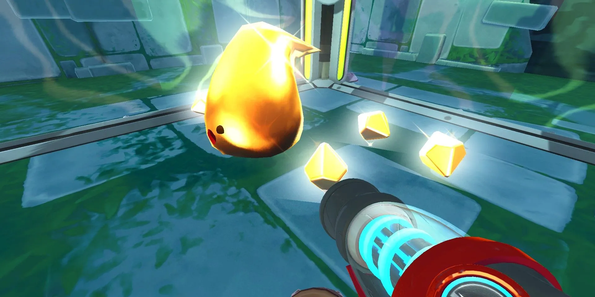 Một gold slime từ Slime Rancher 2 trong chuồng