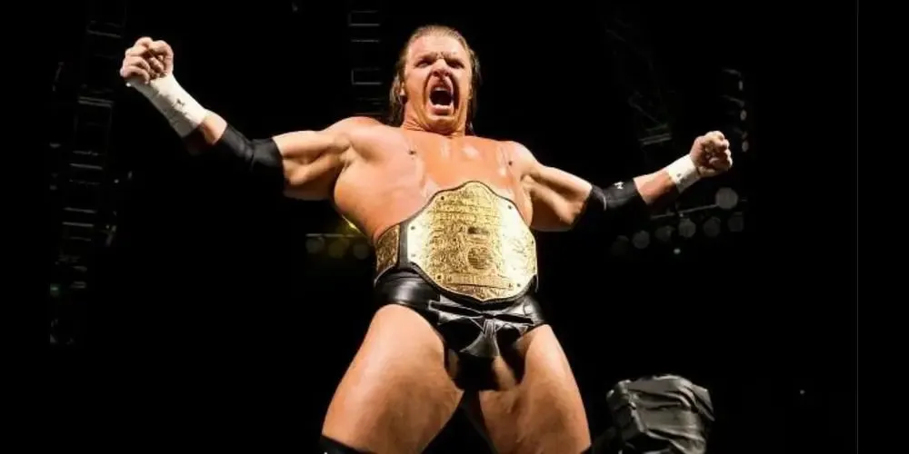 Triple H với đai vô địch thế giới, biểu tượng của &quot;Triều đại Khủng bố&quot;