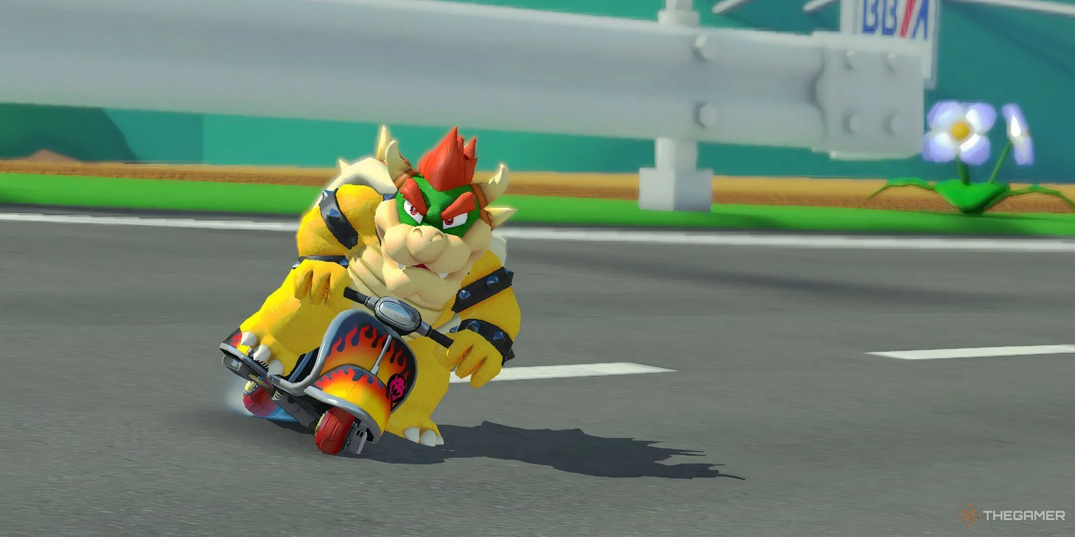 Bowser đang drift lướt ván trên đường đua Rainbow Road trong Mario Kart 8 Deluxe.