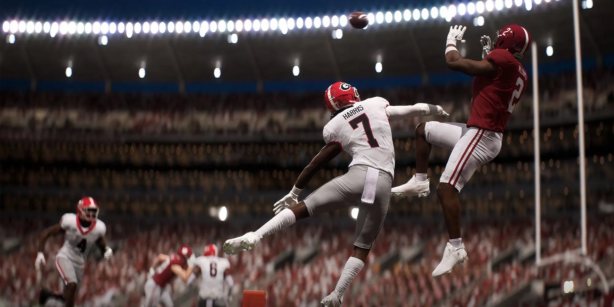 Đội bóng Alabama với huấn luyện viên trong trận đấu College Football 26, liên quan đến tính năng huấn luyện viên thực tế