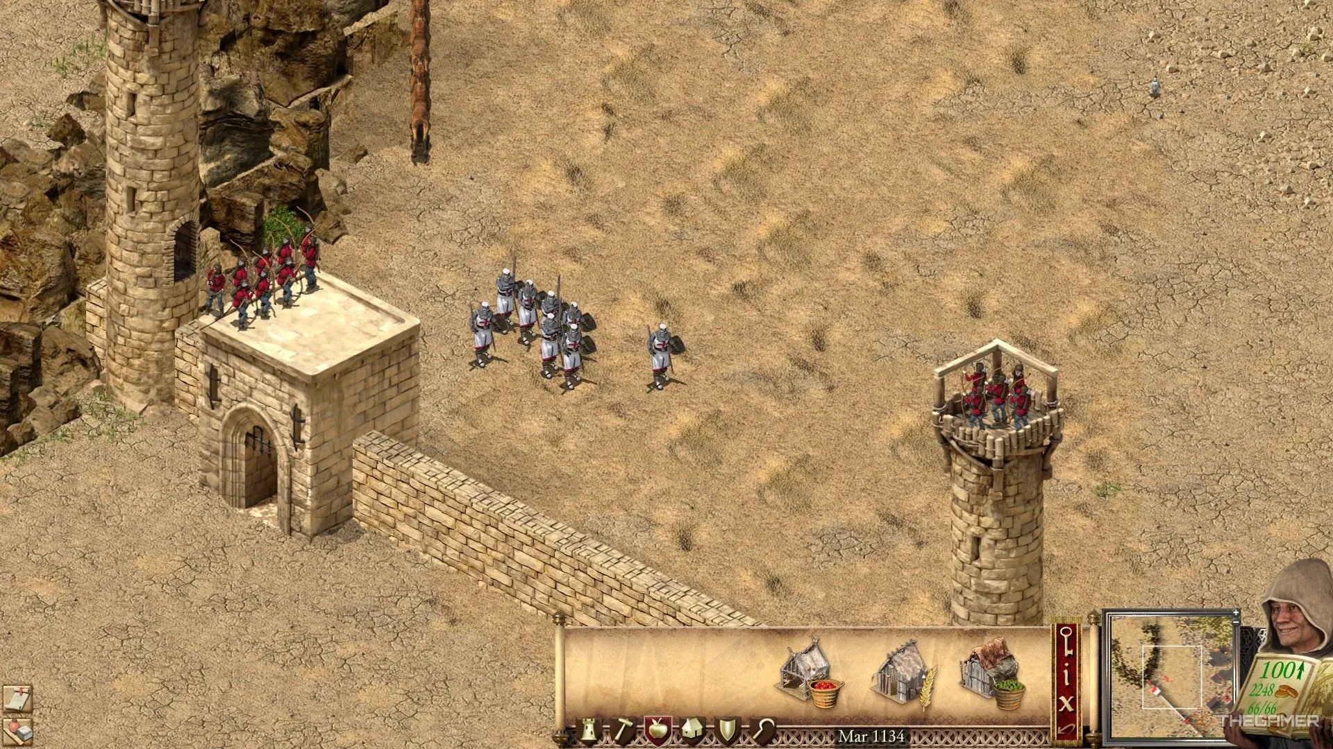 Lính kiếm sĩ và cung thủ Châu Âu phòng thủ cổng thành kiên cố trong Stronghold Crusader Definitive Edition.