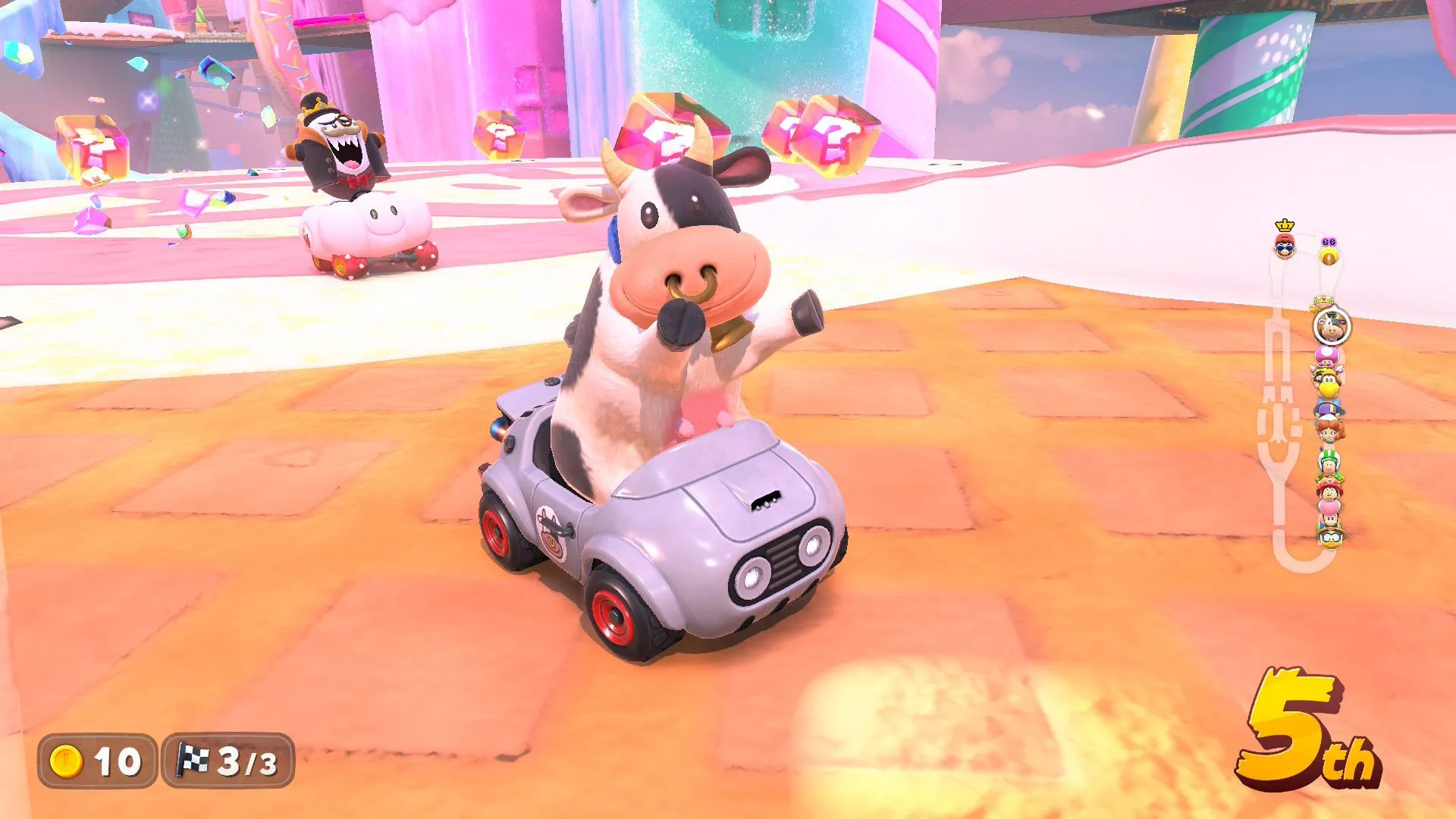 Mario Kart World với nhân vật Bò và phong cảnh đồng quê