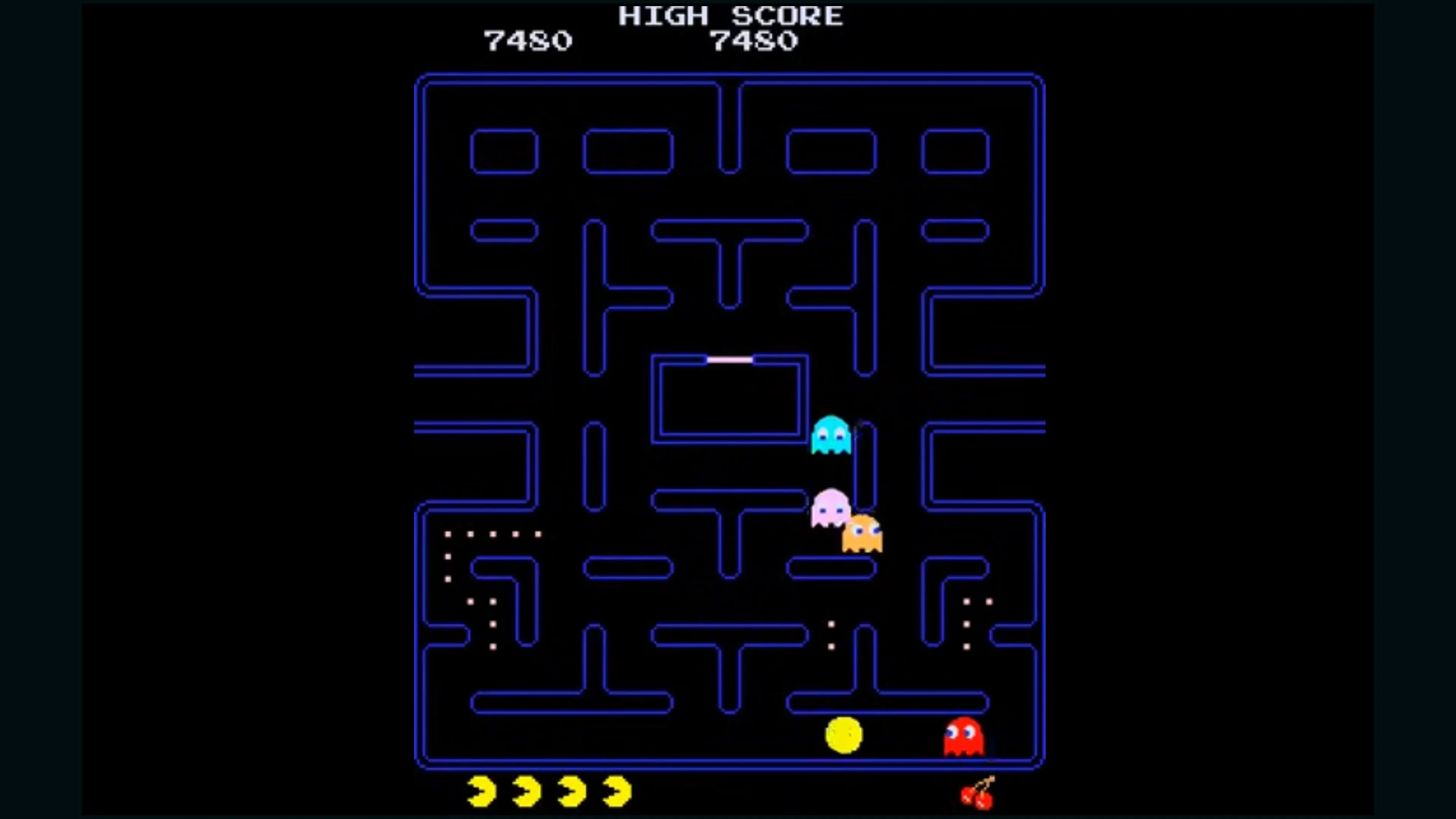 Ảnh chụp màn hình Pac-Man trong game, cảnh mê cung và bóng ma
