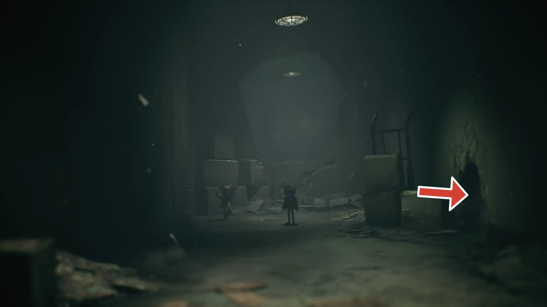 Chìa khóa trên thùng carton dẫn tới cửa khoá cho ghost cuối - Little Nightmares 3