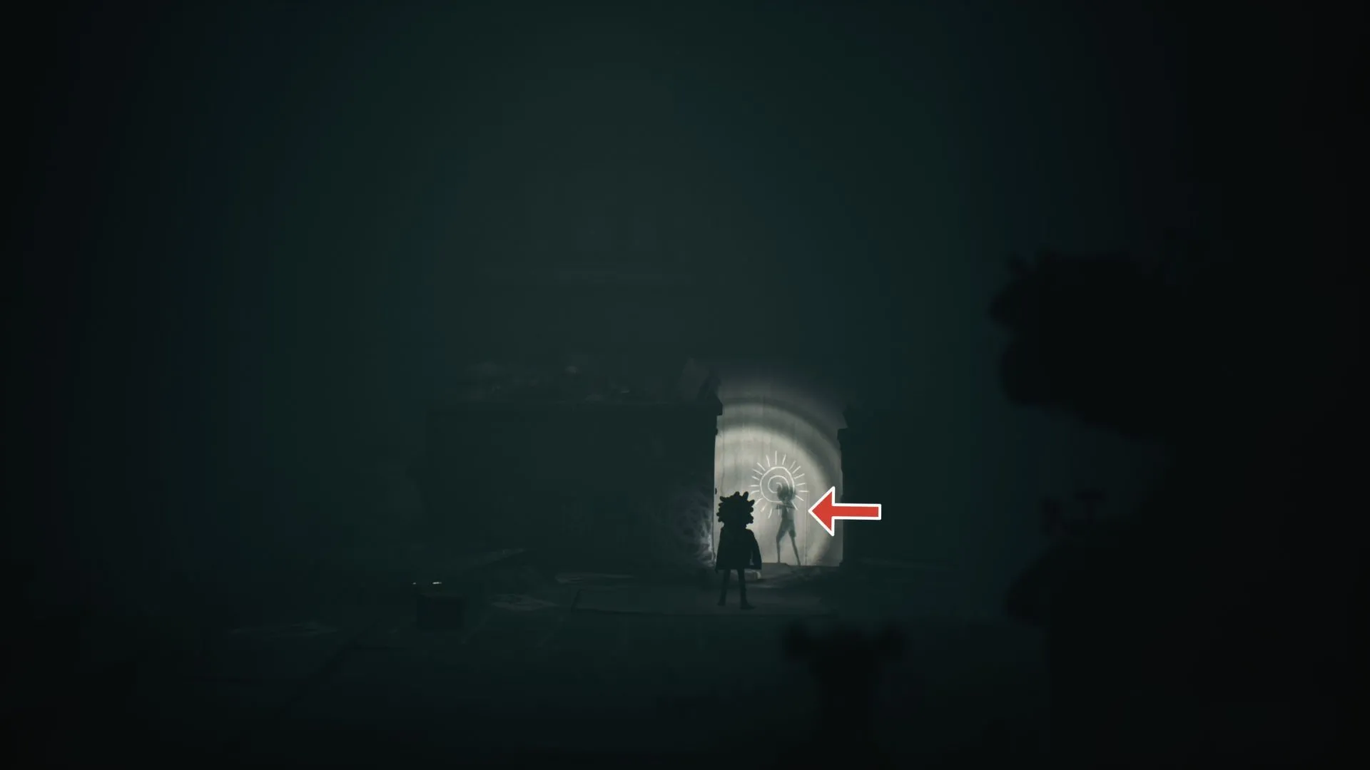 Ghost #2 ngồi vẽ trên tường giữa thùng rác - vị trí Little Nightmares 3